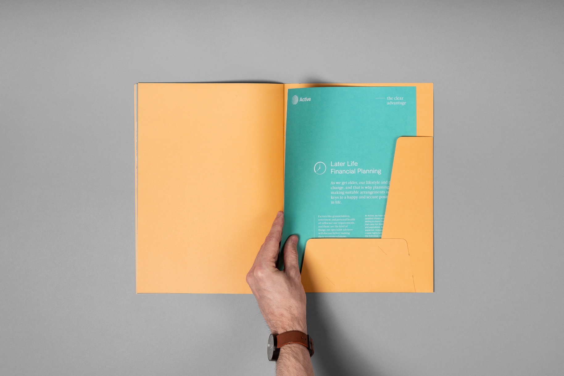 Brochure with Hand